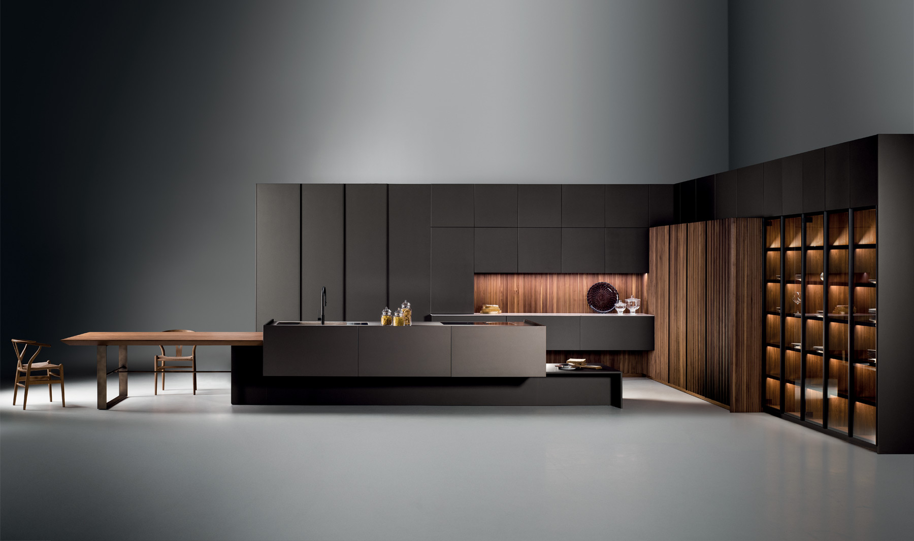 Modern kitchen in walnut and dark color cabinets