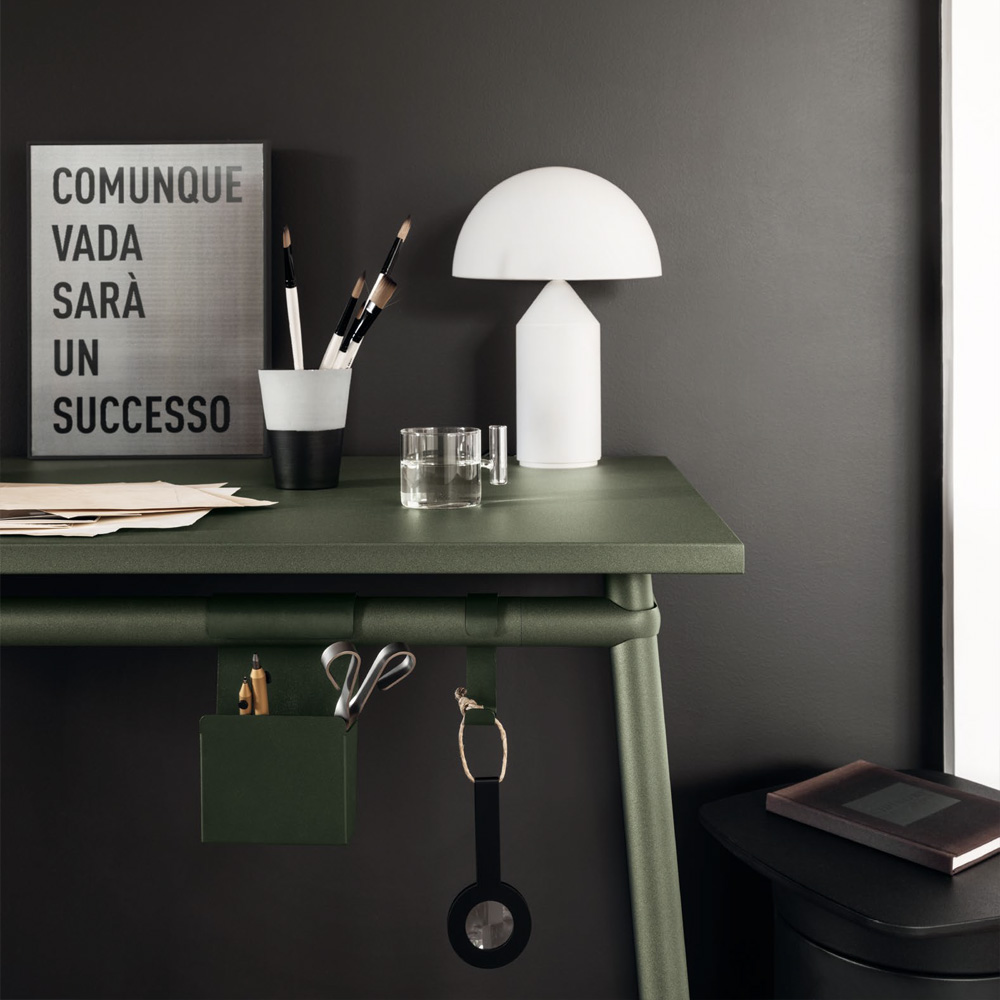 Green metal desk with a modern design