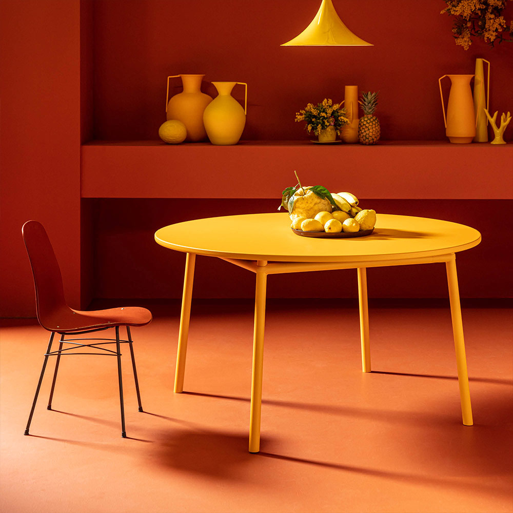 Round yellow metal table