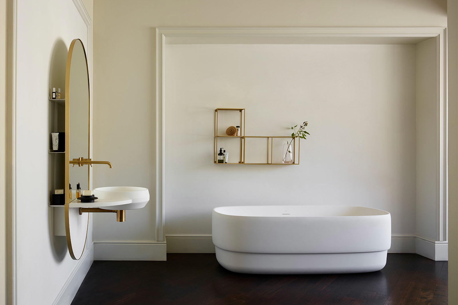 Wall mounted bathroom sink and mirror in brass finish