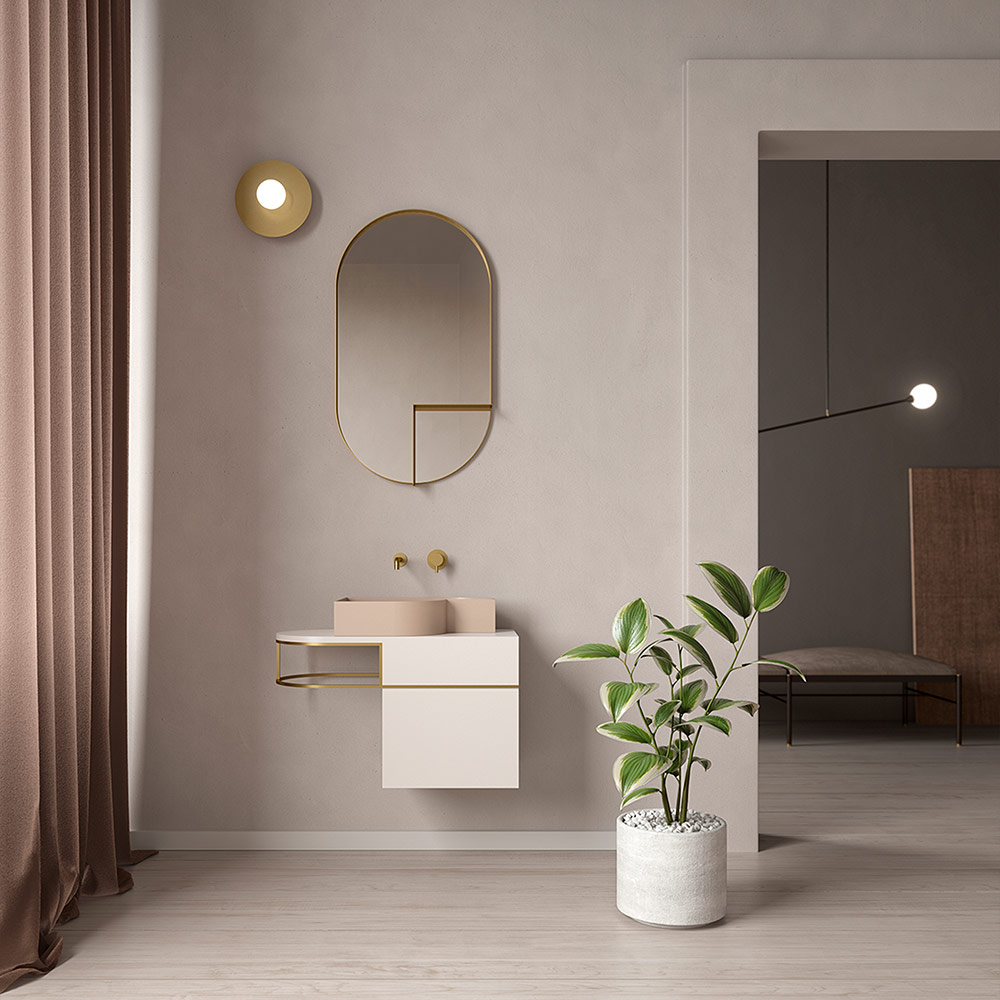 Wall mounted vanity with brass metal frame and pink sink